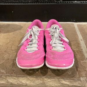 Pink Nike tennis shoes
